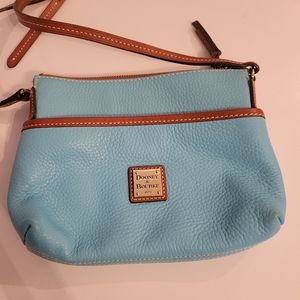 Turquoise Dooney & Bourke over the shoulder purse.